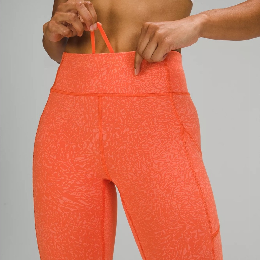 Lululemon 04 - Tangerine Wundertrain Shorts